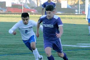 Wyatt Murphy drives past a North Mason defender in his teams final regular season game. (Mark Krulish/Kitsap News Group)