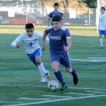 Wyatt Murphy drives past a North Mason defender in his teams final regular season game. (Mark Krulish/Kitsap News Group)