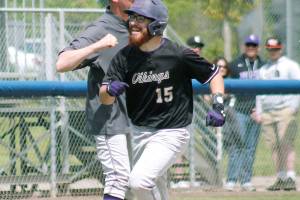 Tucker Gowin celebrates his three-run homer against Franklin Pierce. (Mark Krulish/Kitsap News Group)
