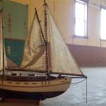 <em>A model ship sits in the massive events hall located in the upstairs area of Longship Marines new location.  </em>Nick Twietmeyer/Kitsap News Group