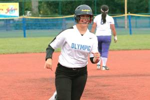 Olympics Sadie Chipley circles the bases after hitting one of her two home runs against North Kitsap in the district tournament third place game. (Mark Krulish/Kitsap News Group)