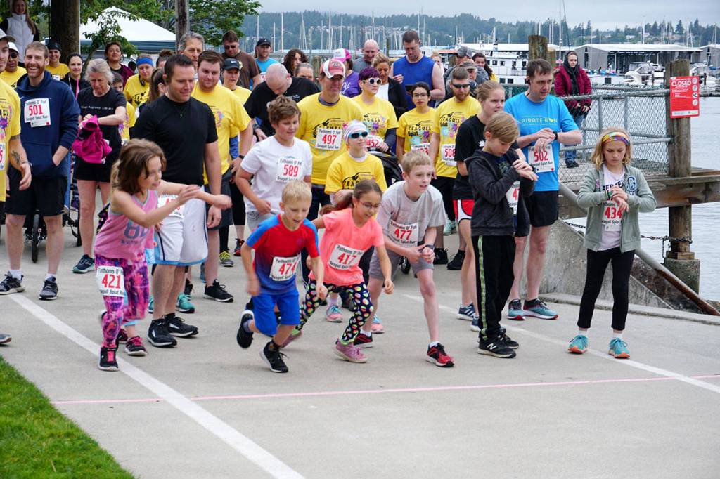 Kids kick into a run at the starting line of the Seagull Splat 5K Run/Walk on Saturday. (Bob Smith | Kitsap Daily News)