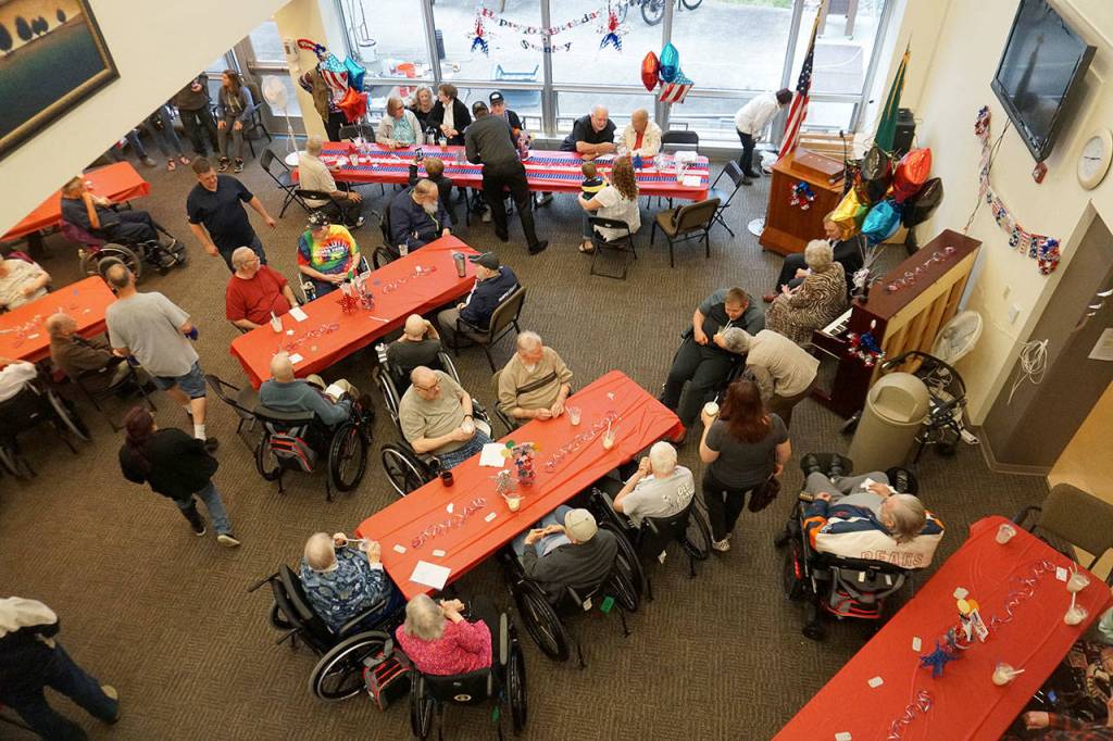 About 100 family members, friends and residents turned out for Stanley Hansens 100th birthday celebration at the Washington Veterans Home in Retsil on May 24. (Bob Smith | Kitsap Daily News)