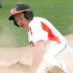 Central Kitsaps Carson Wiler slides into home plate to score one of the 30 runs tallied in the Senior All-Star game.