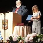 South Kitsap Alternative Programs Principal Pat Oster speaks to the audience attending Explorer Academys graduation ceremony just prior to handing out diplomas to graduating seniors. (Bob Smith | Kitsap Daily News)