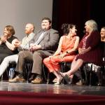 Instructors and staff members from Explorer Academy smile as they accept a round of applause from the South Kitsap High School audience during the graduation ceremony June 10. (Bob Smith | Kitsap Daily News)