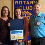 President David Jones (far right) presents South Kitsap High School senior Elena Barnett with the Career & Technical Education Student of the Semester award at a Rotary Club of South Kitsap luncheon on June 18. (Rotary Club of South Kitsap photo)