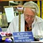 Robert Geiger working in his pharmacy. (Courtesy photo)