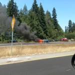 A passerby caught on SR 305 captured this photo of the car as it was engulfed. Photo courtesy of John Kuntz.