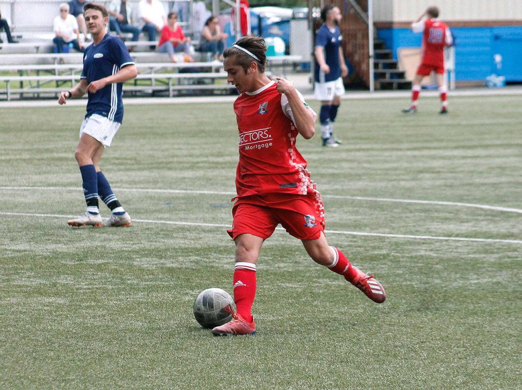 Gabriel Threadgold, a Sounders Academy player and Central Kitsap graduate, looks to make a play near the Spokane net. (Mark Krulish/Kitsap News Group)