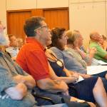 An audience comprising mostly South Kitsap supporters listen as Kitsap Public Facilities District board members discuss their project preferences at their meeting on Monday. (Bob Smith | Kitsap Daily News)