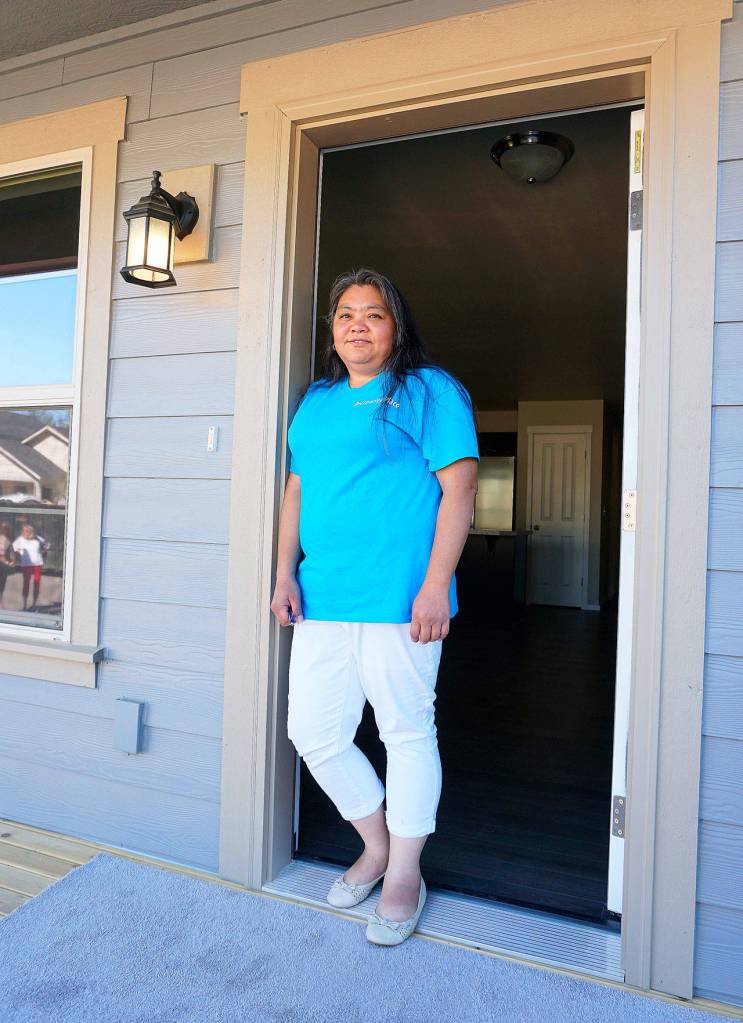 New owners at Prosperity Place hammer their way to a new life