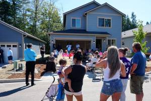 New owners at Prosperity Place hammer their way to a new life