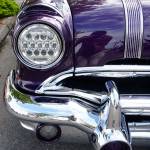 Vintage automobiles from the age of eye-popping chrome covers and fenders dotted the Port Orchard waterfront at the 32nd annual CRUZ Car Show. (Bob Smith | Kitsap Daily News)