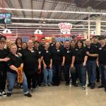 Grocery Outlet Bargain Market employees join owner-operators Greg Bovan and Deeann Haberly-Bovan (fourth and fifth from right) for a group shot inside the new store. (Courtesy photo)