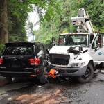 The driver of a Toyota Sequoia died Aug. 17 in a collision with a Puget Sound Energy utility truck. The accident took place at the intersection of Miller Bay Road Northeast and Northeast Wood Bay Road near Suquamish. Photos courtesy of KCSO