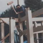 A giant mallet is used to pound in the frame for a house Makoto Imai built in Japan.