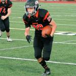 Senior running back Joshua Willis rushed 36 times for 254 yards and two touchdowns in a 41-17 victory over Olympic. (Mark Krulish/Kitsap News Group)