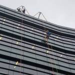 Elected officials, volunteers rappel down Norm Dicks Government Center for charity