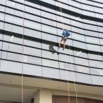 Elected officials, volunteers rappel down Norm Dicks Government Center for charity
