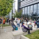 Elected officials, volunteers rappel down Norm Dicks Government Center for charity