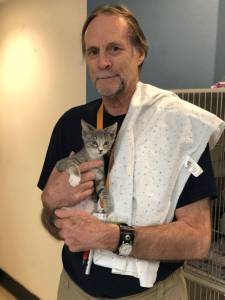 Humane Society volunteer sets record with 3,000th cat adoption
