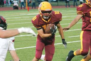 Kyler Coe-Yarr escapes for a big gain against Port Townsend. (Mark Krulish/Kitsap News Group)