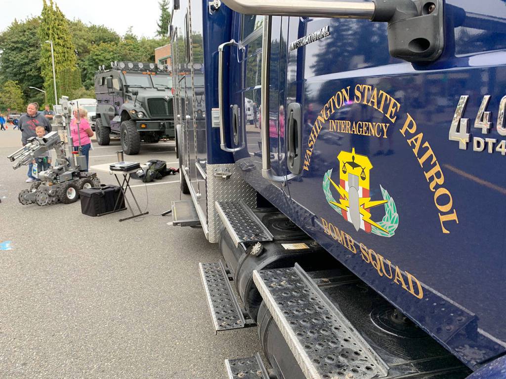 Visitors got a chance to see a demonstration on how the Washington State Patrols interagency bomb squad operates its unmanned robot when it captures an explosive device. (Bob Smith | Kitsap Daily News)