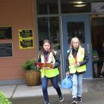 Patrollers Emalee Baysden and Hailey Langford get to work early Monday morning.