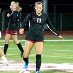 South Kitsaps Franqie Moppins sends a pass towards her winger against Graham-Kapowsin. (Mark Krulish/Kitsap News Group)