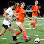 Madisyn Diabo flicks a ball upfield to a teammate. (Mark Krulish/Kitsap News Group)