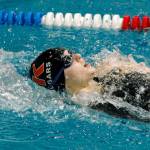 Central Kitsaps Amanda Ashmore swims to victory in the 100 yard backstroke at the Olympic Swimvitational. Ashmore also won Swimmer of the Meet. (Mark Krulish/Kitsap News Group)