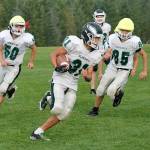 Klahowyas Max Garvey carries the ball during a recent practice. (Mark Krulish/Kitsap News Group)