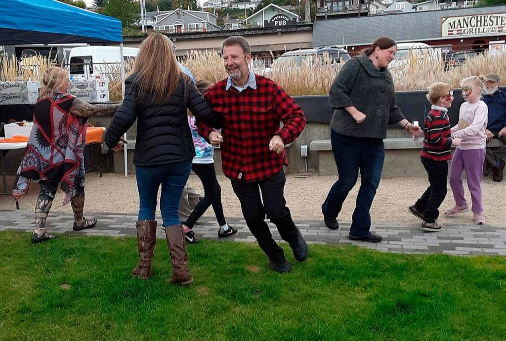 Saturday afternoon revelers try on their proverbial dancing shoes during an Oktoberfest musical interlude. (Jana Mackin photo)