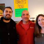 Jana Mackin photo                                Laurieann and Salman Aladin (shown with their son Shan, at left) are the new owners of the Manchester Grill.