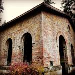 Lichen green and the reds of fired brick exude a splash of ruddy color on the exterior of Manchester State Parks enclosed picnic area, which once was a storage facility for torpedo munitions early last century. (Bob Smith | Kitsap Daily News)
