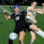 Klahowyas Tori Peters battles with Vashon Islands Mari Kanagi for a loose ball in her teams 3-1 victory on Tuesday. (Mark Krulish/Kitsap News Group)
