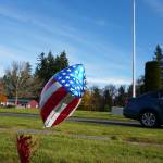 Cemeteries containing the remains of honored veterans  including Sunset Lane Memorial Park in Port Orchard  were visited by somber family members on this quiet Monday afternoon who left miniature flags and small stars-and-stripes-adorned balloons next to the plaques and monuments of their loved ones who served the nation at some point of their lives. (Bob Smith | Kitsap Daily News)
