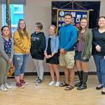 Left to right: Renee Wallace, Shae Dean, Emma Wilcox, Samantha Washburn, Reese Wilson, Deyondre Davis, Sara Reidy, Bella Walker and Kiwanis Club President Carroll Olson. (South Kitsap School District photo)