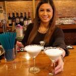Carla Toizumi, head bartender at Bay Street Bistro, prepares drinks at the restaurants new bar. (Bob Smith | Kitsap Daily News)