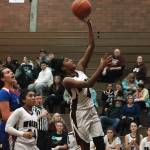 Mark Krulish | Kitsap News Group                                Kiki Prudhomme gets up and over the Graham-Kapowsin defense for a layup.