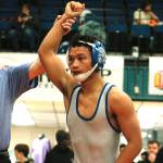 Olympics Anjelo Pangelinan took home a championship at 113 after pinning his first three opponents and then winning a major decision in the finals. (Mark Krulish/Kitsap News Group)