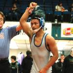 Olympics Anjelo Pangelinan took home a championship at 113 after pinning his first three opponents and then winning a major decision in the finals. (Mark Krulish/Kitsap News Group)