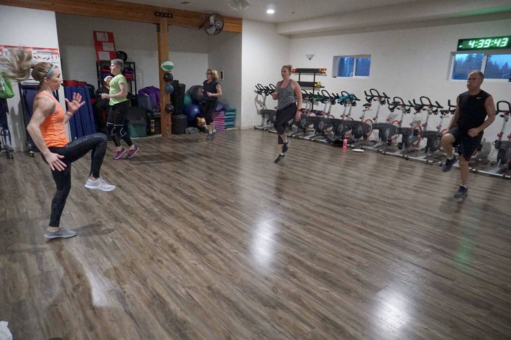 Erin Mussett of Port Orchard leads Insanity, a cardio body conditioning class at Westcoast Fitness. (Mike De Felice photo)