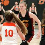 Kingstons Ellee Brockman looks to drive the lane against Central Kitsaps Maddy Anderson. Brockman had a game-high 17 points for the Bucs in their win. (Mark Krulish/Kitsap News Group)