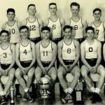 The 1948 Bainbridge boys state championship basketball team is one of two teams to be inducted into the Kitsap Athletic Roundtables Kitsap Sports Hall of Fame. Back row: Bob Dixon, Pete Uglesich, Bob Woodman, Jack Start, Bob Olsen, Ray Lowrie, Coach Tom Paski. Front row: Bob Sigle, Bob Buchanan, Dale Wallace, Don Nadeau, Jim Nadeau, Don Barnes, Sam Clarke. (Photo courtesy KAR)