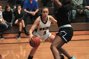 South Kitsaps Natalie Millet looks to dribble past Kiara Maxwell of Curtis. (Mark Krulish/Kitsap News Group)