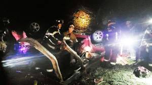 Kitsap County Technical Rescue Team works feverishly to save two people trapped in their overturned vehicle after it drove off a 40 foot cliff. Fire Captain Jeran McCormick, Navy Region NW