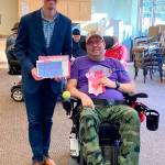 Rep. Kilmer shares Valentines Day cards with a resident at the Washington Home for Veterans in Port Orchard. (Rep. Kilmers office photo)