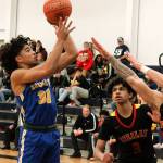 Kimo Retome gets a shot up and over the Steilacoom defense in Bremertons 54-52 win on Wednesday. (Mark Krulish/Kitsap News Group)